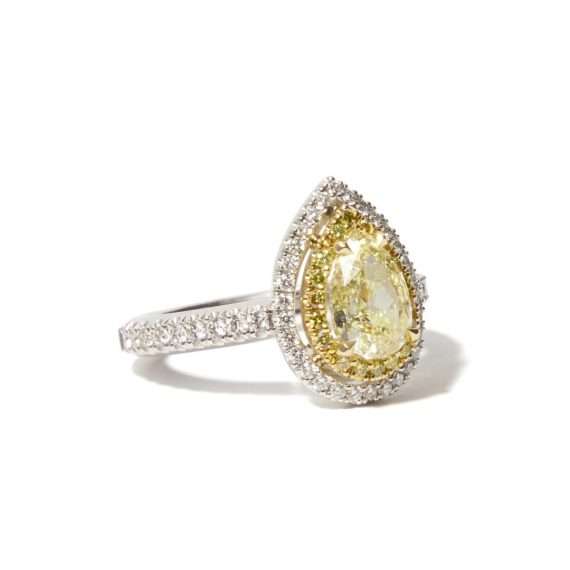 White gold ring with yellow diamond