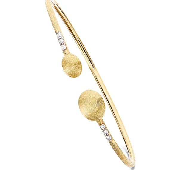 Nanis Elite Dancing Boules bangle yellow gold with diamonds